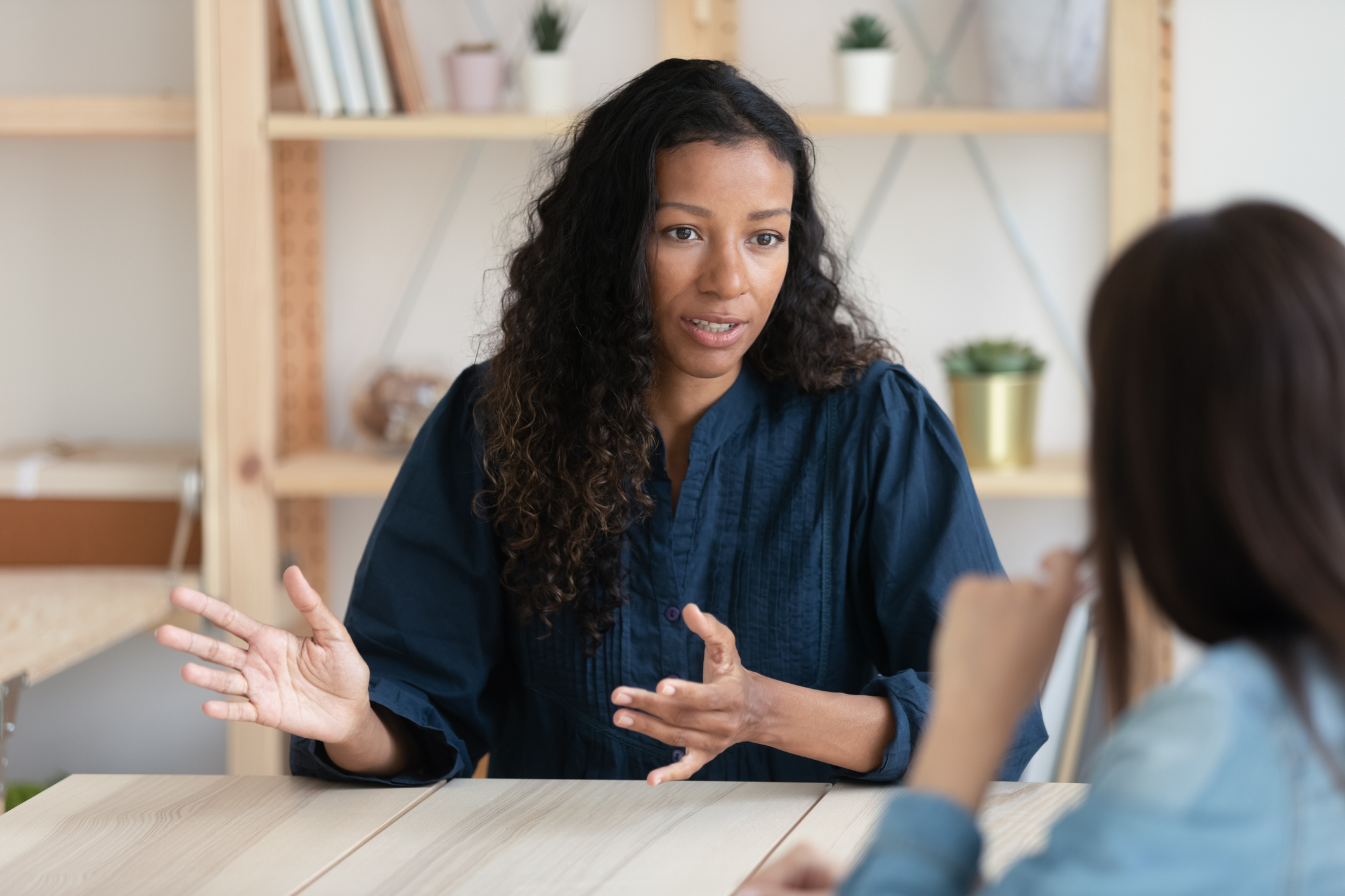 Two women talking