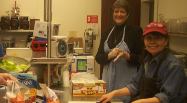 Putting together healthy lunches in a school cafeteria kitchen