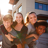 A group of teenagers hanging out and having fun.